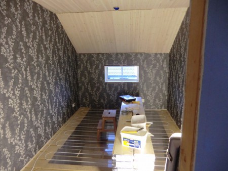 Biblioteket, med rätta murr-tapeten